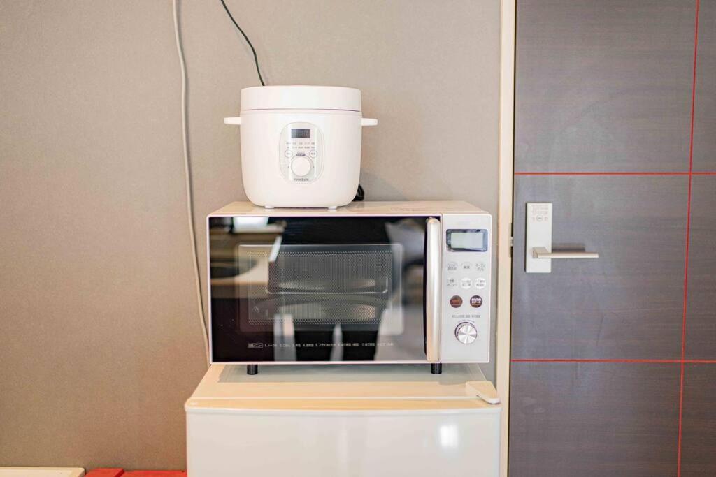 Apartmán メルシアター鈍色の風・最上階デザイナーズルーム Ósaka Exteriér fotografie