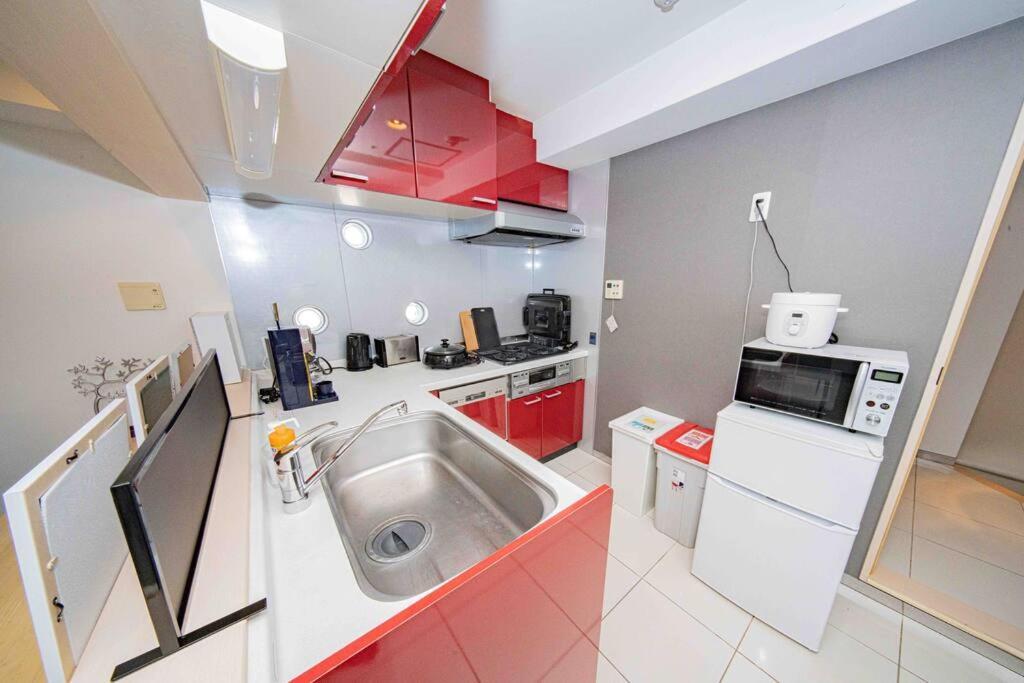 Apartmán メルシアター鈍色の風・最上階デザイナーズルーム Ósaka Exteriér fotografie